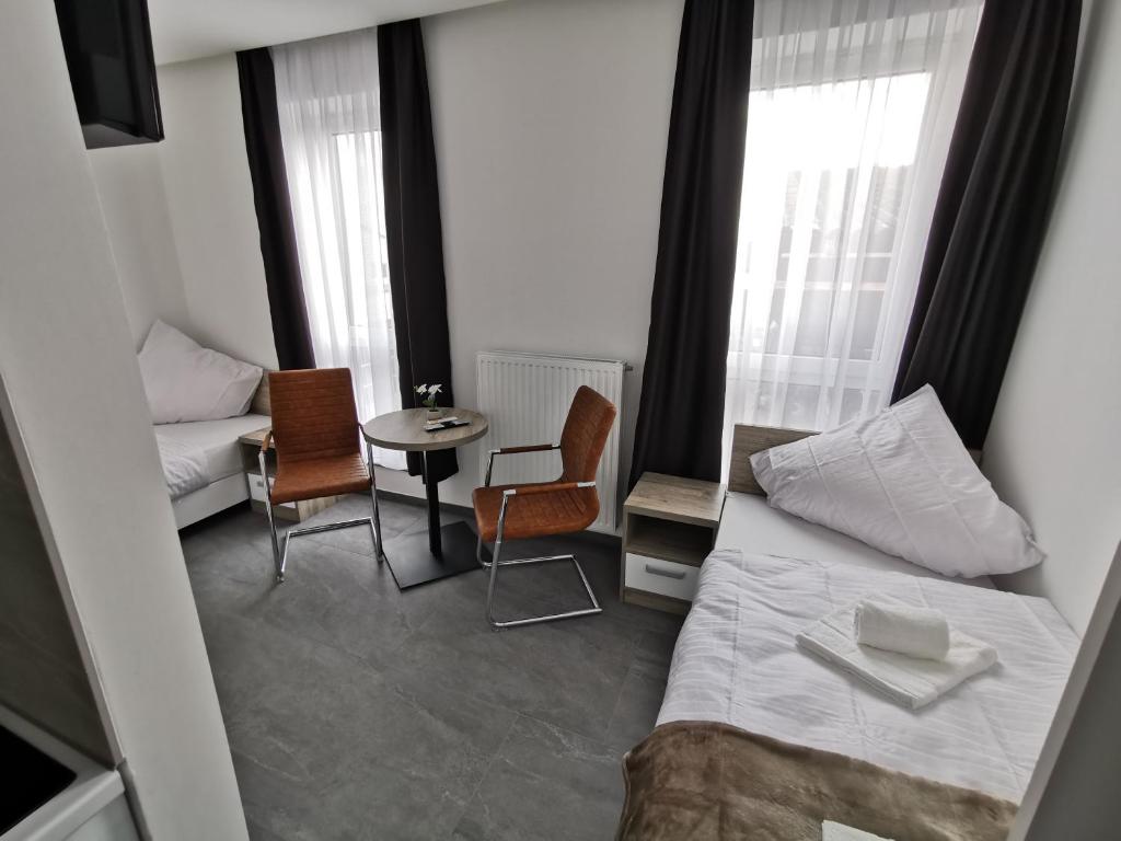 HP Apartments - Studio Comfort Twin Bed