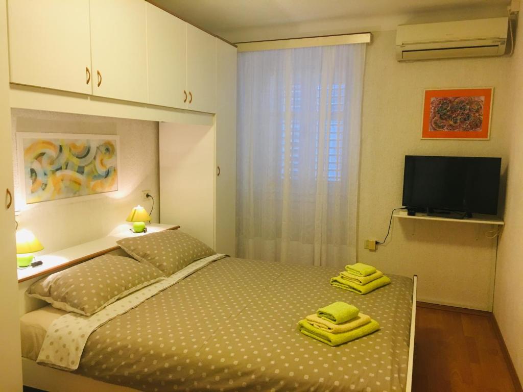 Postel nebo postele na pokoji v ubytování Apartment Filipas