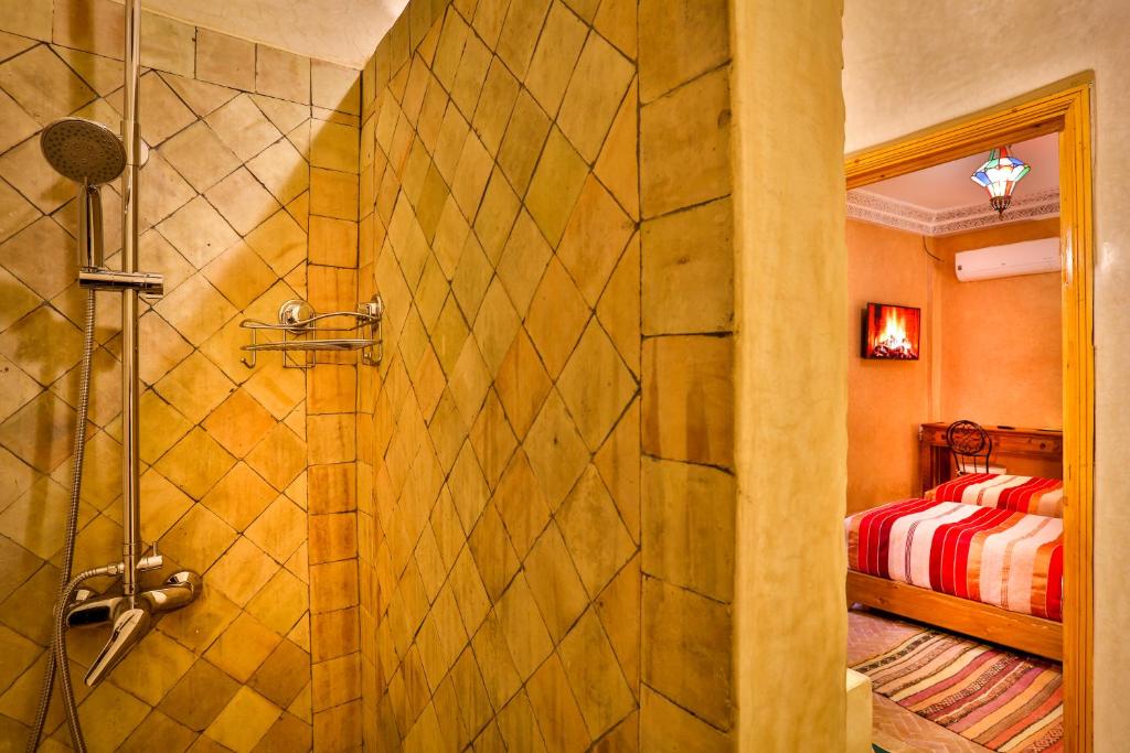 Postel nebo postele na pokoji v ubytování RIAD VILLA SIDI BABA