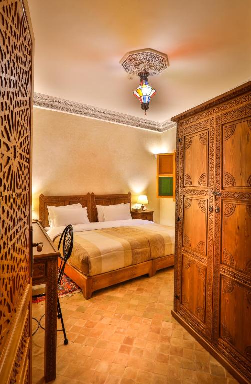 Postel nebo postele na pokoji v ubytování RIAD VILLA SIDI BABA