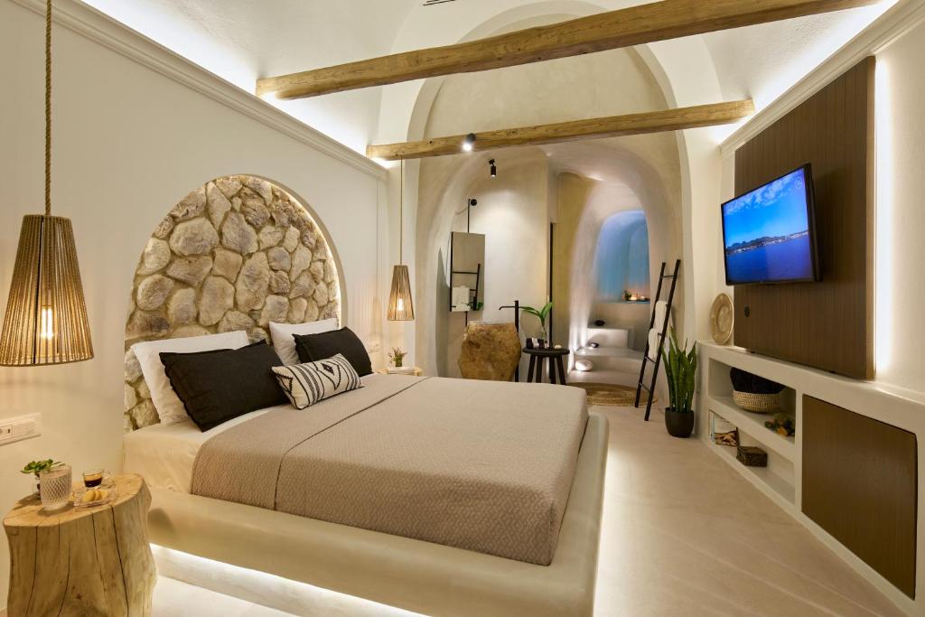 TV a/nebo společenská místnost v ubytování Floria Suites