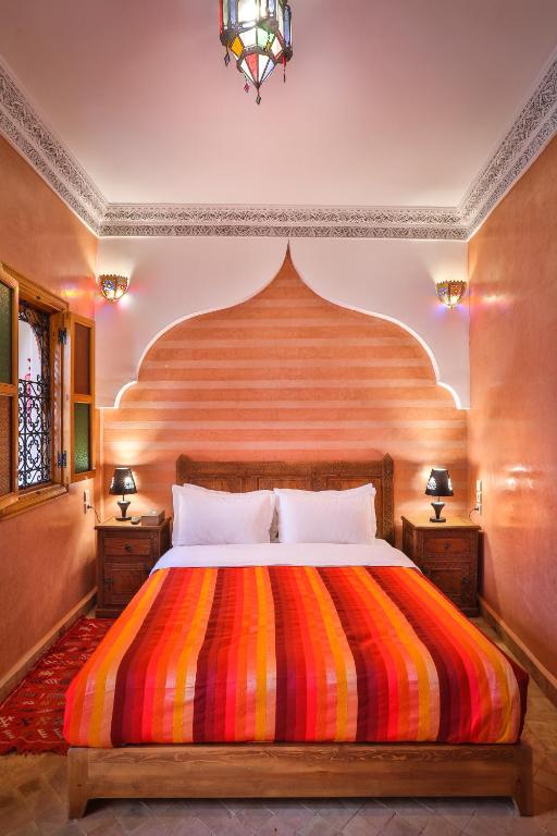 Postel nebo postele na pokoji v ubytování RIAD VILLA SIDI BABA