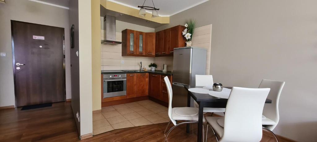 Kuchyň nebo kuchyňský kout v ubytování Quiet Apartments Kościelna