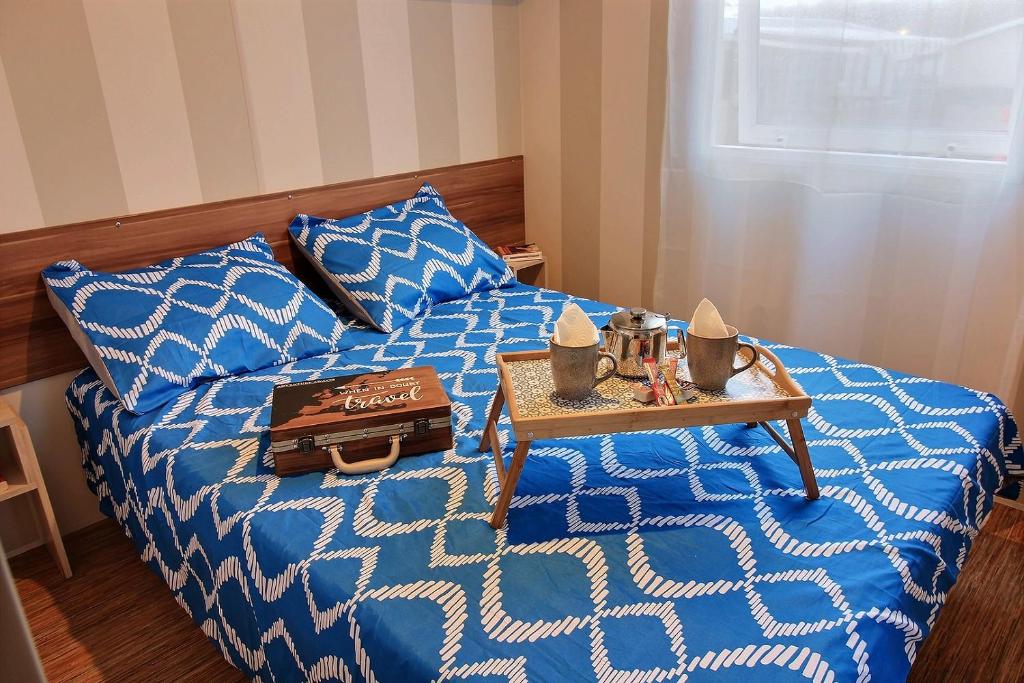 Postel nebo postele na pokoji v ubytování MOBILHOME Familial