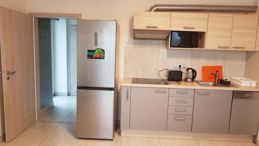 Kuchyň nebo kuchyňský kout v ubytování Apartmány Stráň