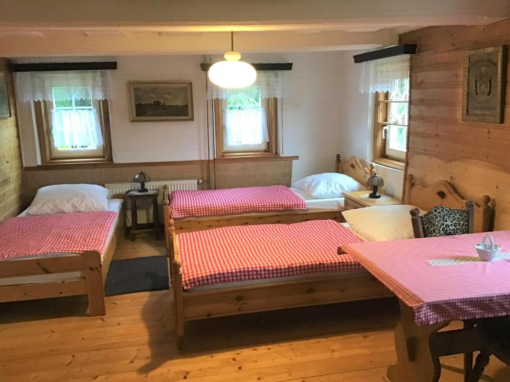 Postel nebo postele na pokoji v ubytování Chalupa Medium