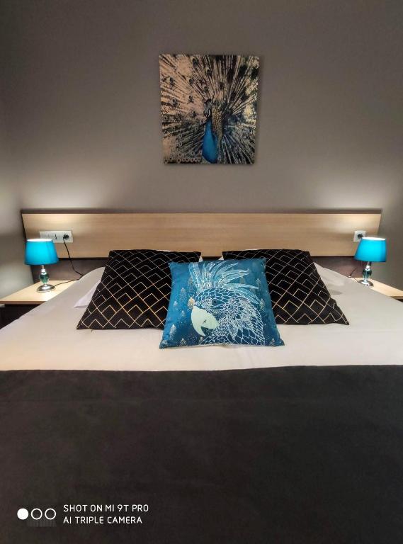 Postel nebo postele na pokoji v ubytování Celtic Hotel