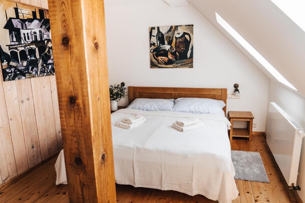Postel nebo postele na pokoji v ubytování Ábelův mlýn
