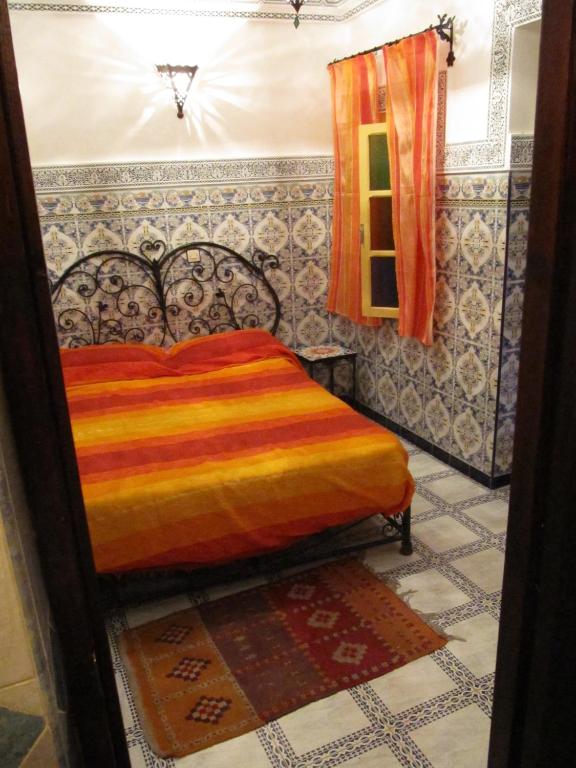 Una cama o camas en una habitación de Sindi Sud