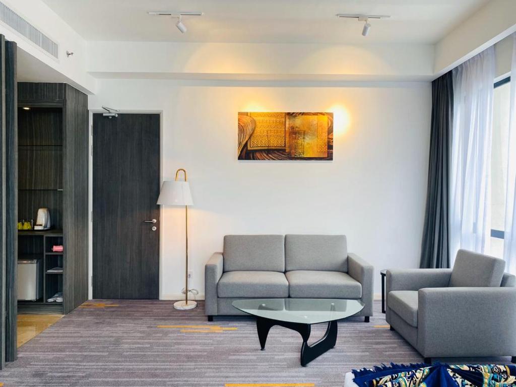 Posezení v ubytování Bahang Bay Hotel