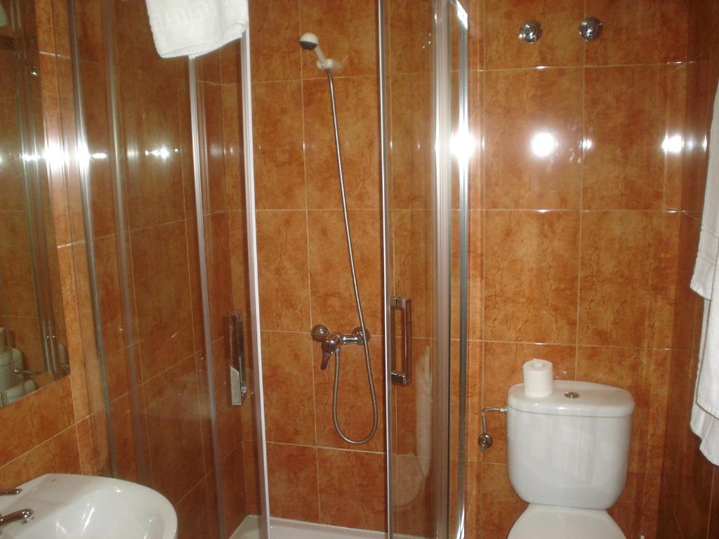 Kúpeľňa v ubytovaní HOSTAL CID
