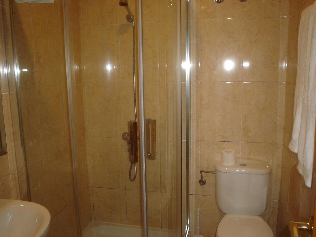 Kúpeľňa v ubytovaní HOSTAL CID