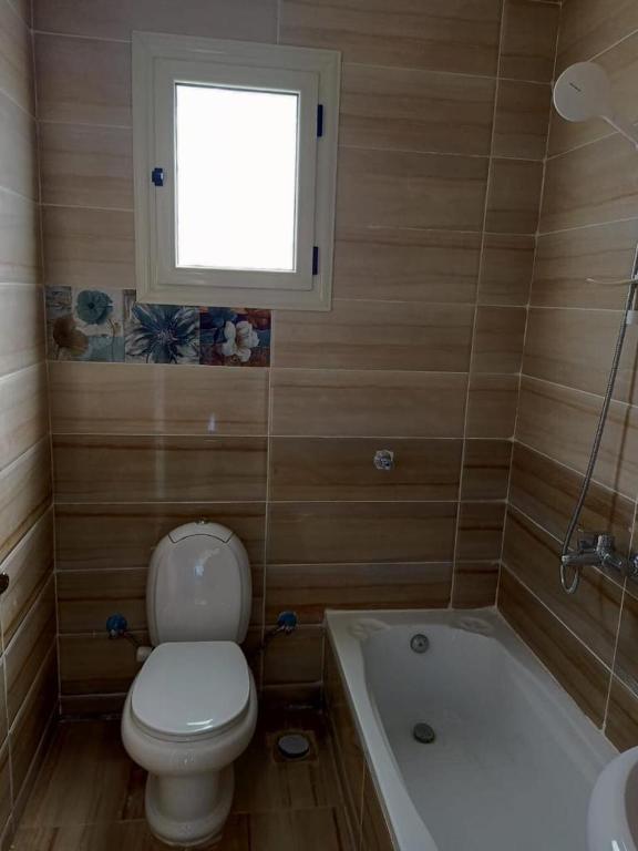 Koupelna v ubytování Badr Deluxe Apartments - Families Only