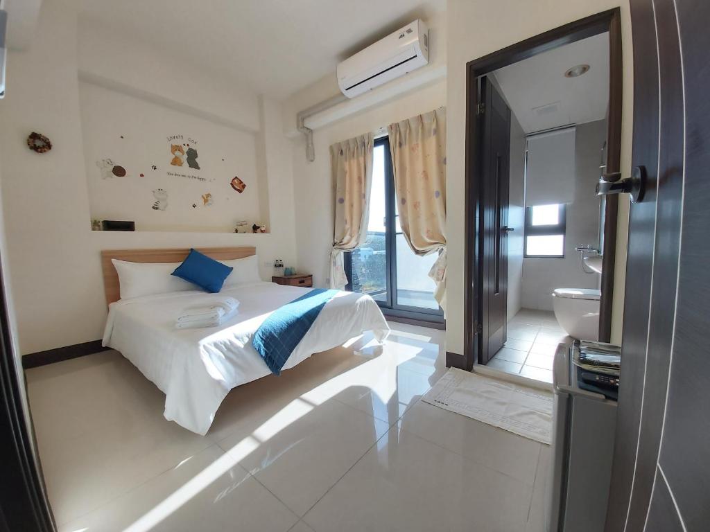 Ένα ή περισσότερα κρεβάτια σε δωμάτιο στο Henchun Hope Homestay