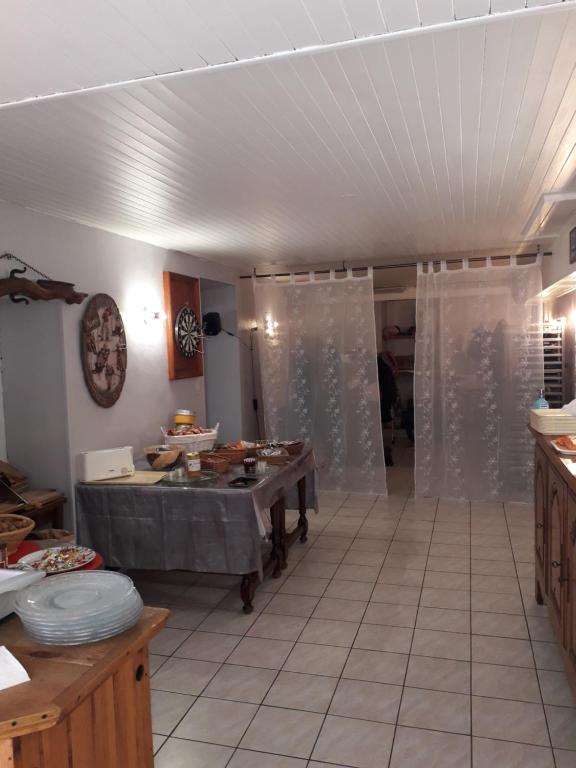 Postel nebo postele na pokoji v ubytování Pension Saint Antoine