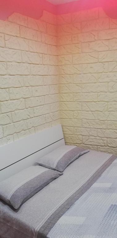 A bed or beds in a room at b&b ERCOLANO Scavi