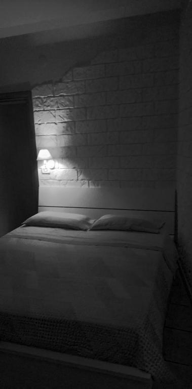 A bed or beds in a room at b&b ERCOLANO Scavi