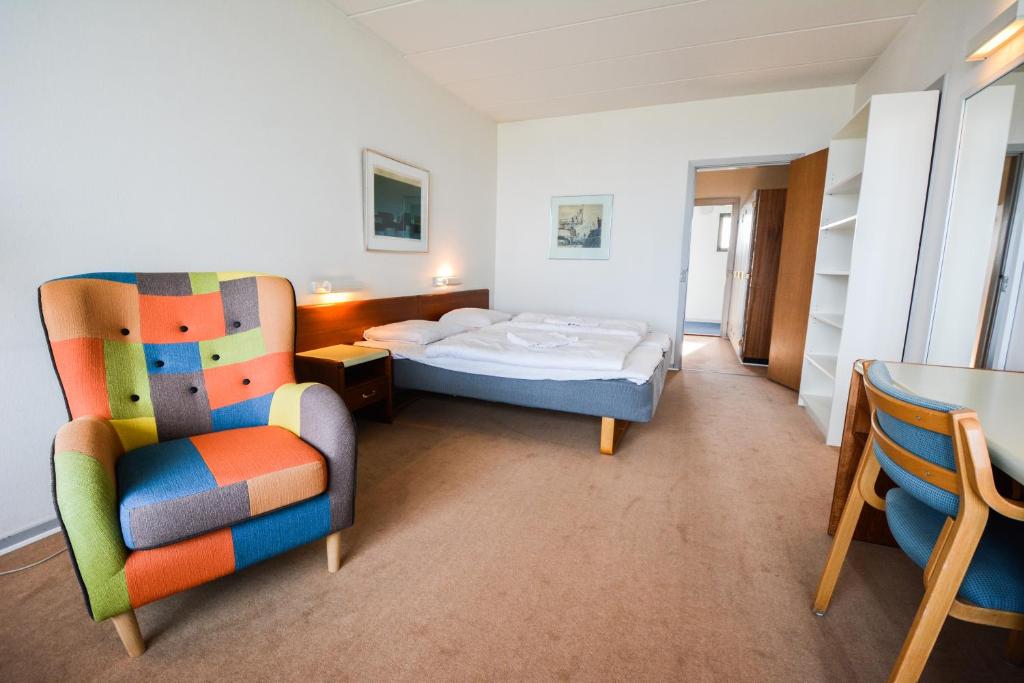 Postel nebo postele na pokoji v ubytování Hotel Østersø