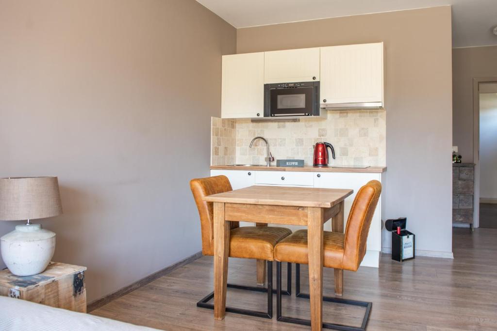 Kuchyň nebo kuchyňský kout v ubytování B&B Fragaria