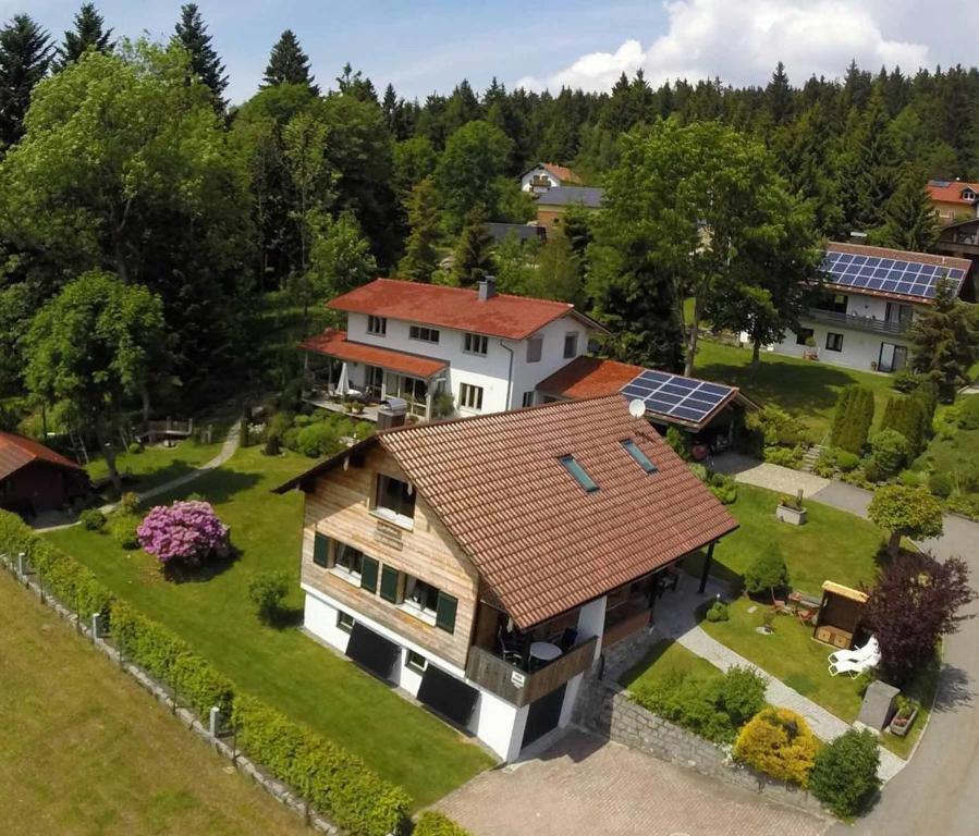 an aerial view of a house with a solar roof at Landhaus in der Irlau in Sankt Englmar