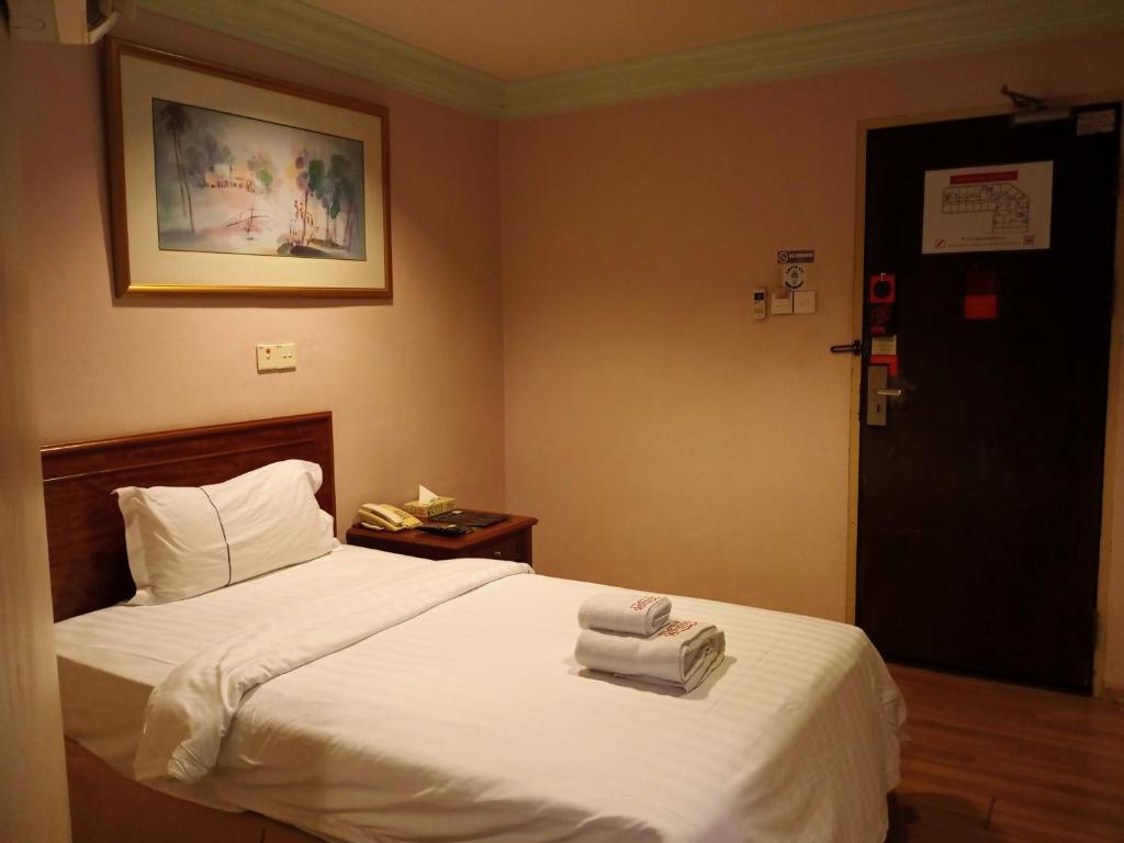 Postel nebo postele na pokoji v ubytování Hotel Deleeton