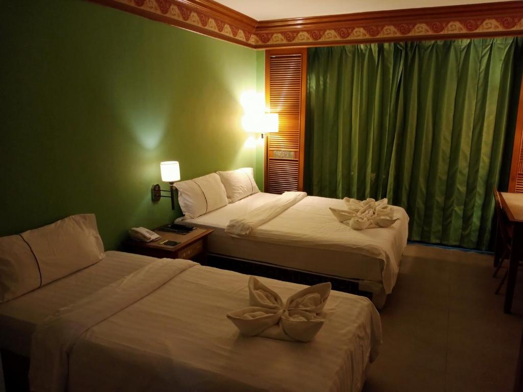 Postel nebo postele na pokoji v ubytování Hotel Deleeton