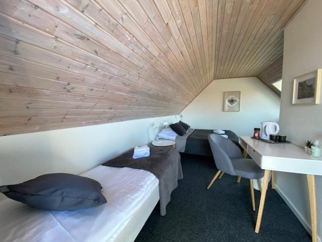 Postel nebo postele na pokoji v ubytování Skagen Motel