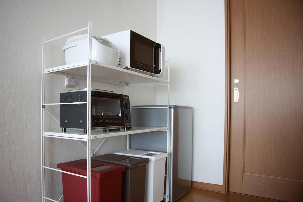 Kuchyň nebo kuchyňský kout v ubytování THE STAY WAKKANAI