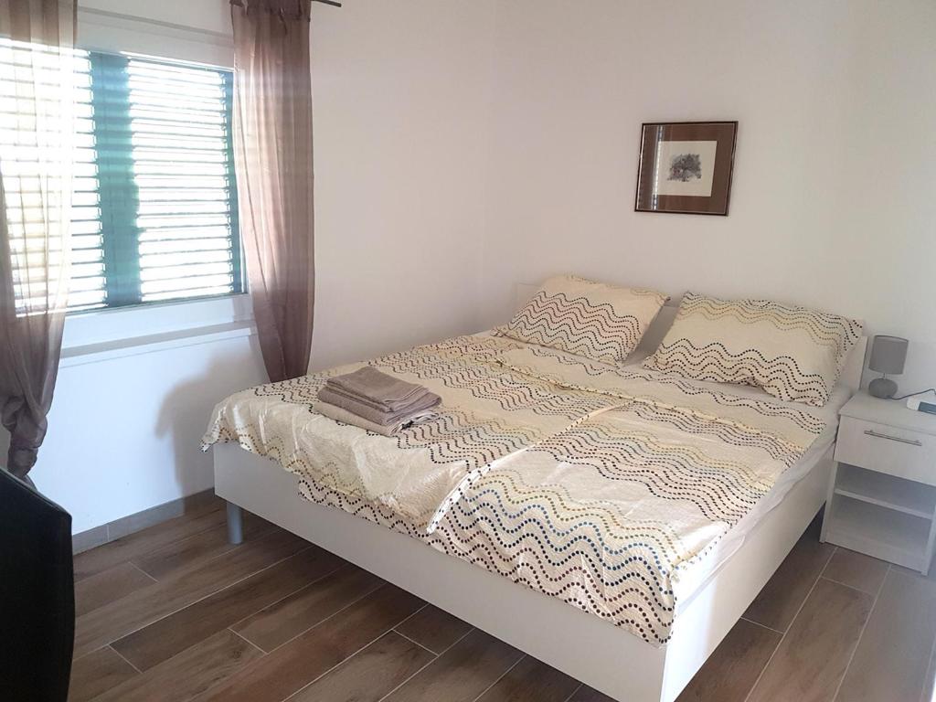 Postel nebo postele na pokoji v ubytování Villa Niva