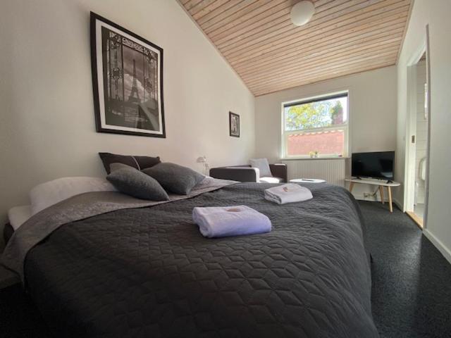 Postel nebo postele na pokoji v ubytování Skagen Motel