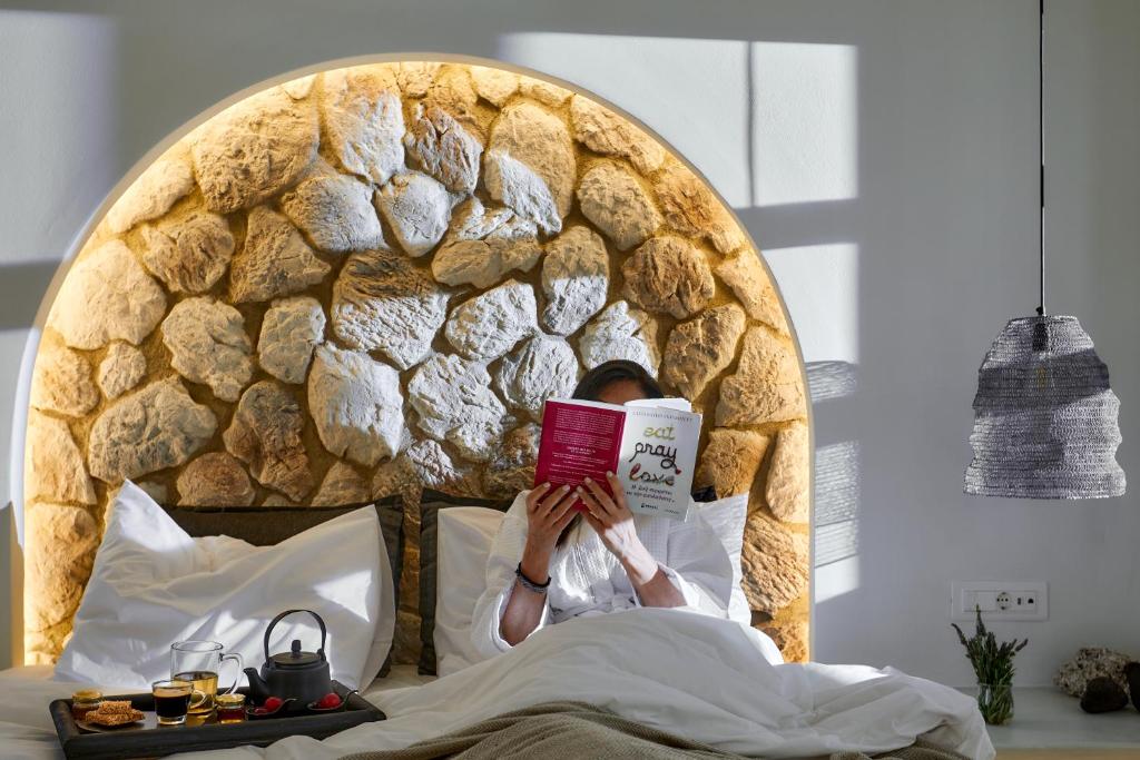 Postel nebo postele na pokoji v ubytování Floria Suites