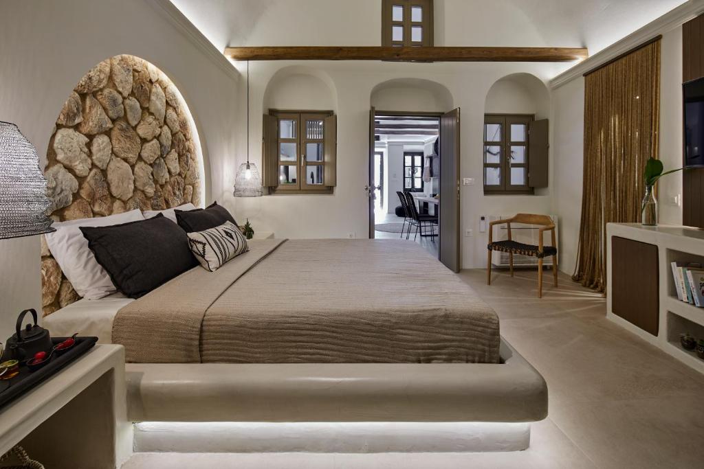 Postel nebo postele na pokoji v ubytování Floria Suites
