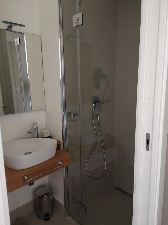 A bathroom at Athena Charming Rooms