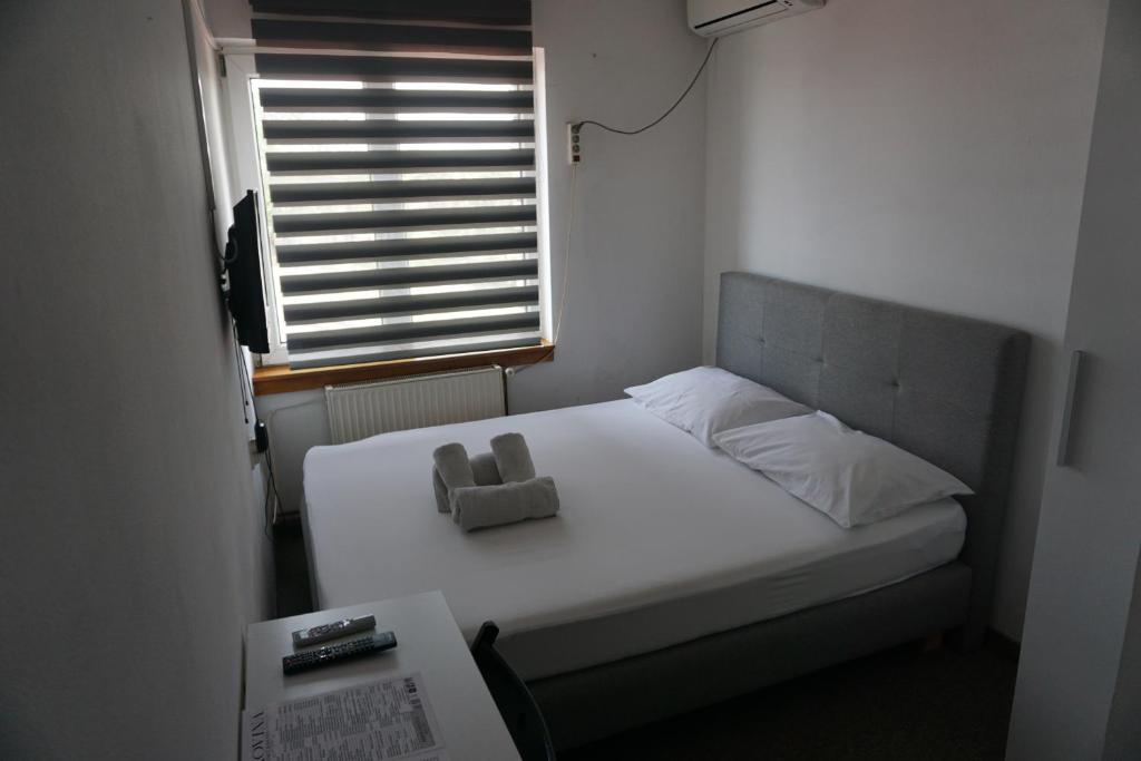 Postel nebo postele na pokoji v ubytování Guesthouse & restaurant Tekovina