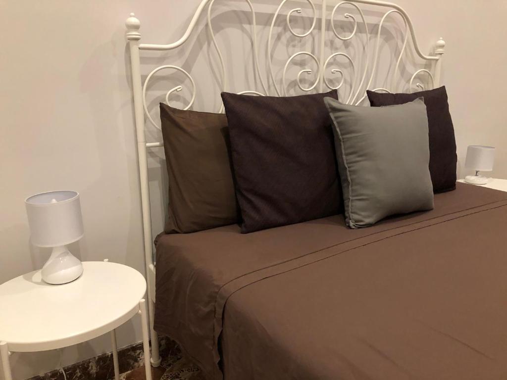 Postel nebo postele na pokoji v ubytování B&B Meliora Rooms