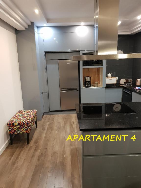 Kuchnia lub aneks kuchenny w obiekcie Apartamenty Amalia