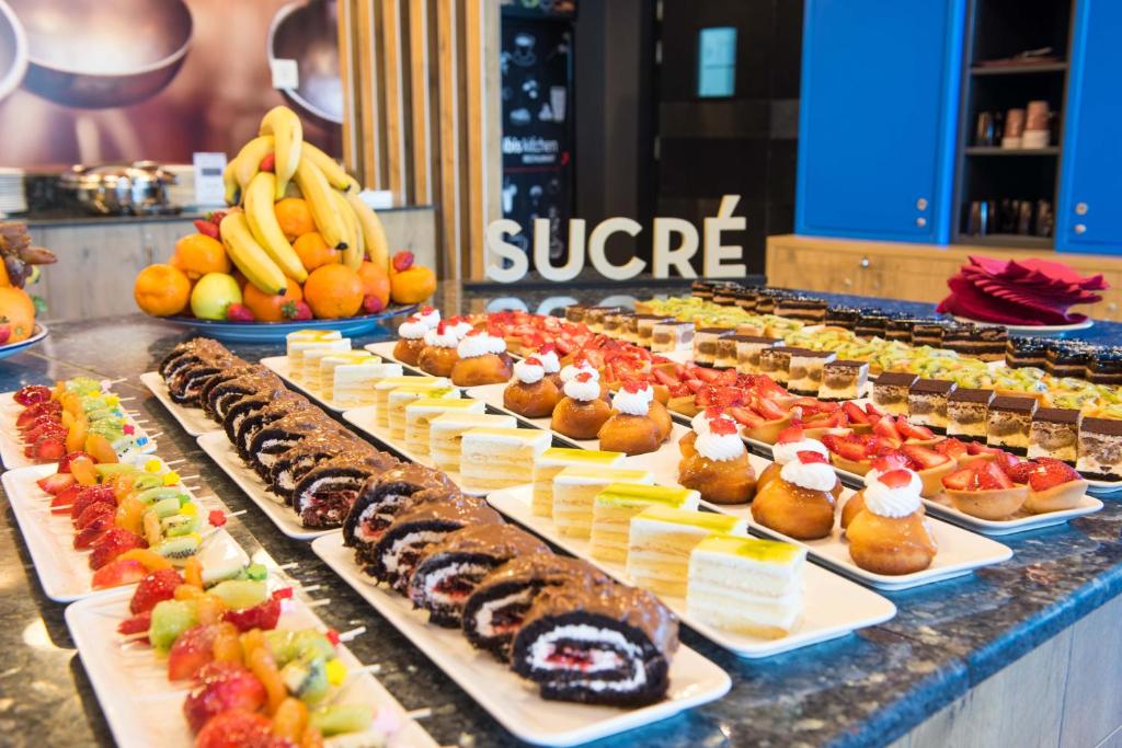 a buffet line with many different types of desserts at ibis Alger Aéroport in Alger