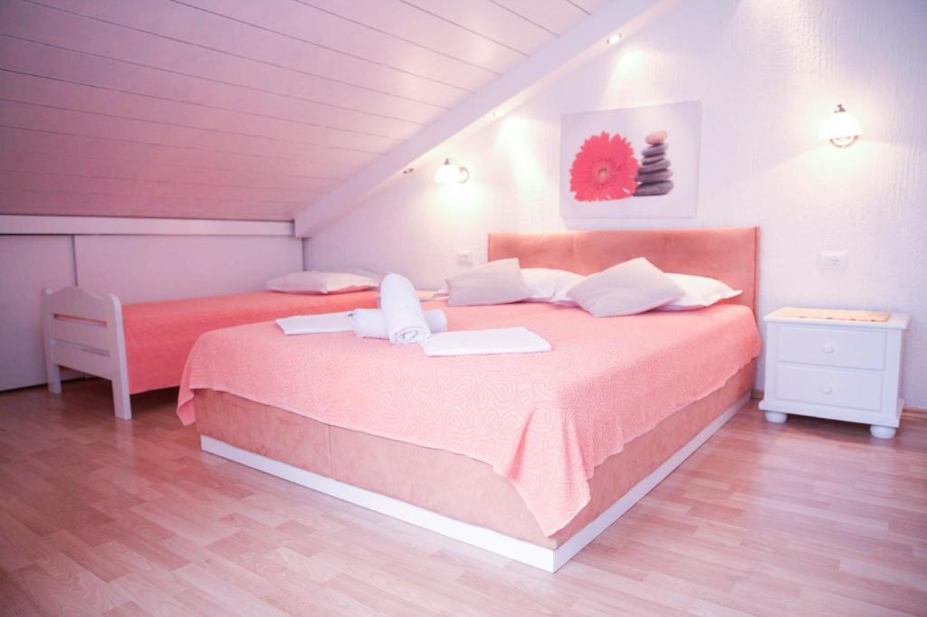 Postel nebo postele na pokoji v ubytování House Bilic