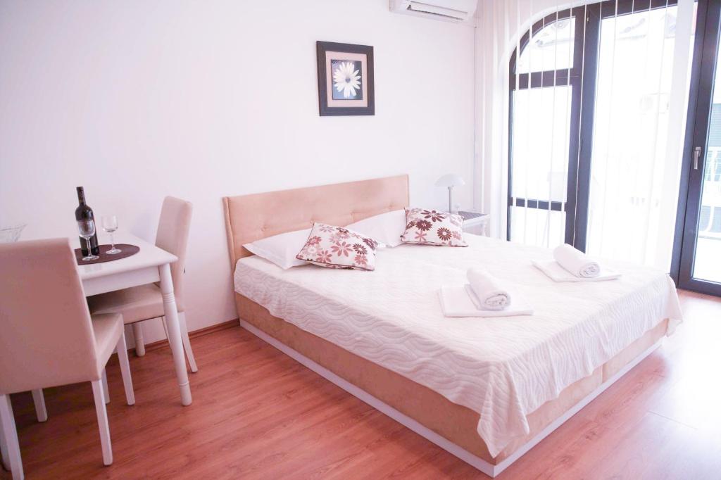 Postel nebo postele na pokoji v ubytování House Bilic