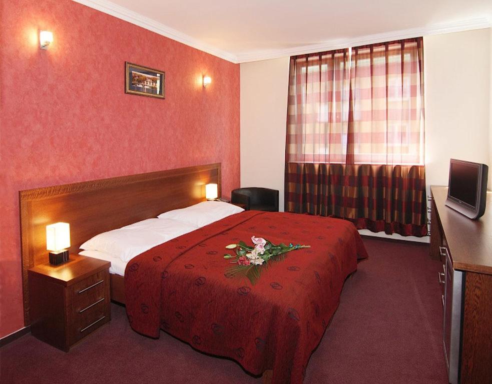 Postel nebo postele na pokoji v ubytování Relax Inn