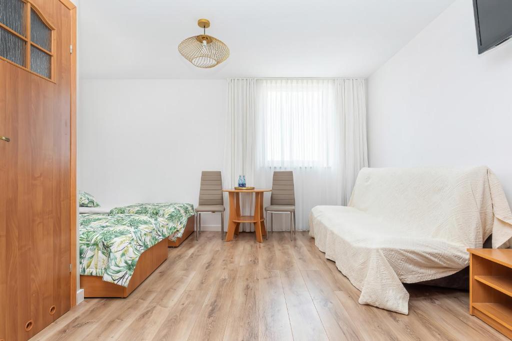 Postel nebo postele na pokoji v ubytování Paula
