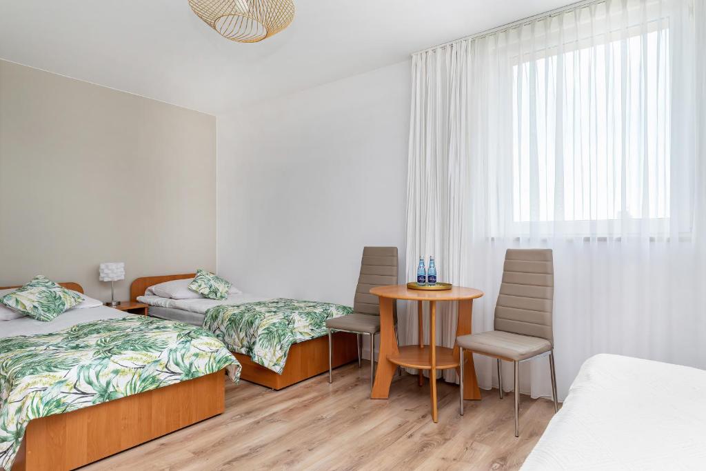Postel nebo postele na pokoji v ubytování Paula