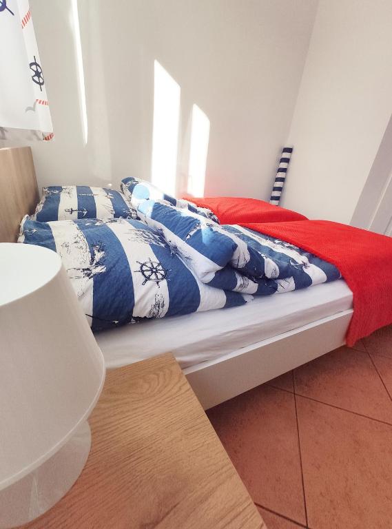Postel nebo postele na pokoji v ubytování Willa Nord