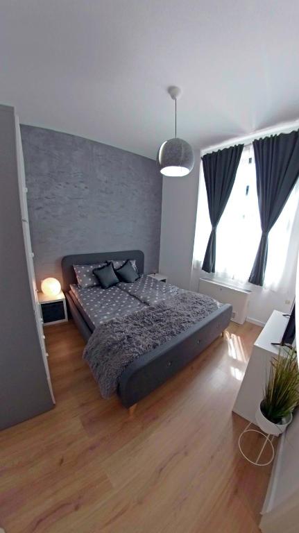 Postel nebo postele na pokoji v ubytování MiTRa Luxury Apartments