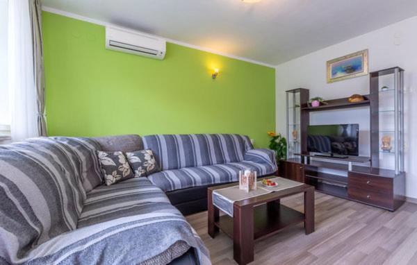 Televízia a/alebo spoločenská miestnosť v ubytovaní Relax apartman Split