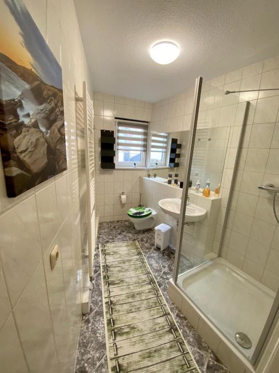 Vannituba majutusasutuses Pension Regenbogen