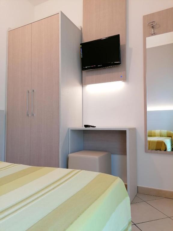 Postel nebo postele na pokoji v ubytování HOTEL ANDREA'S