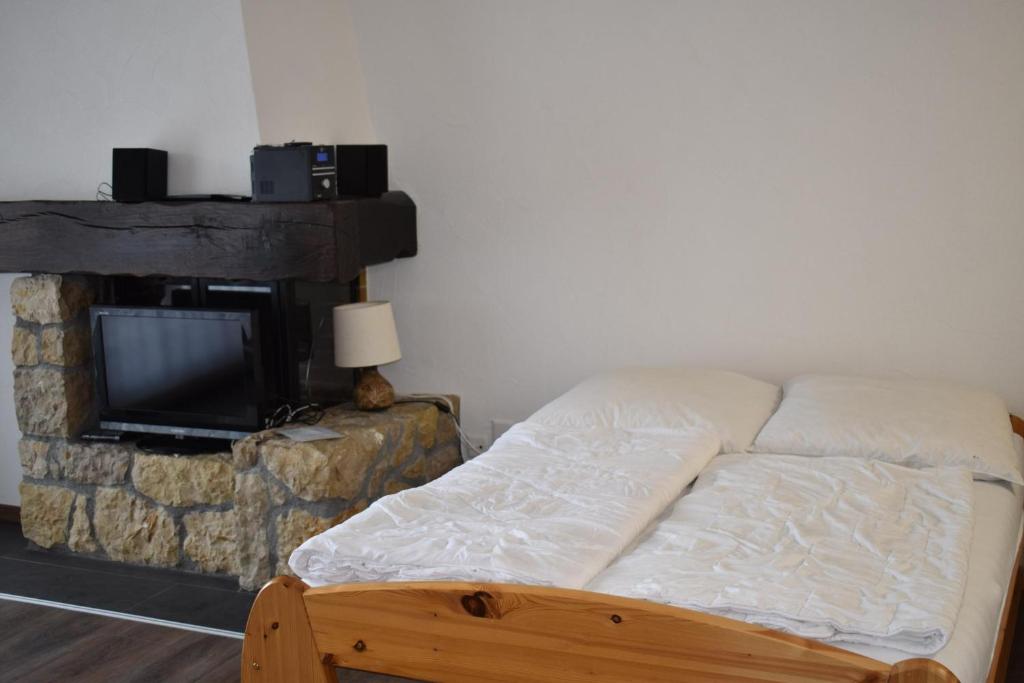 Postel nebo postele na pokoji v ubytování Astoria (105 Sh)