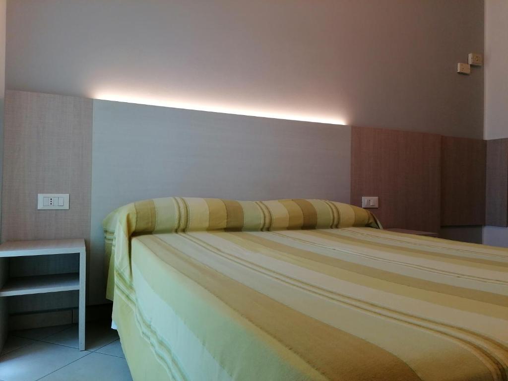 Postel nebo postele na pokoji v ubytování HOTEL ANDREA'S