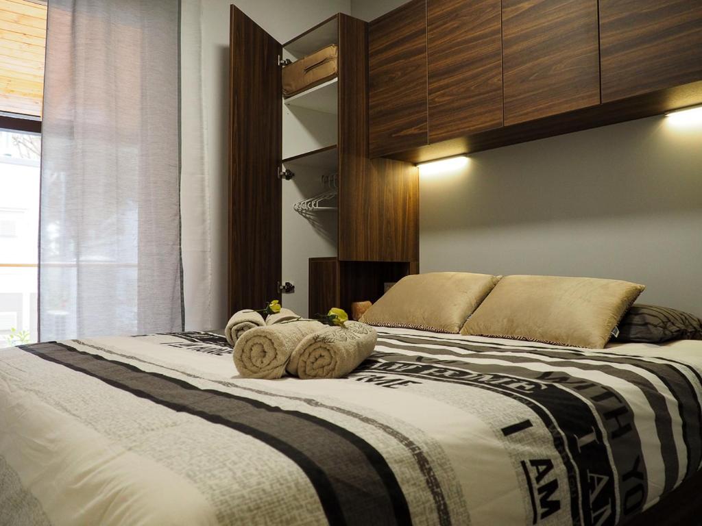 Postel nebo postele na pokoji v ubytování Lux Camp Bi Village, Mobile home Villa Buba